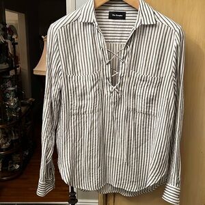 Strip blouse by The Kooples size 3
80% viscose 20% cotton